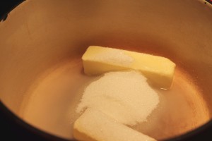 Combine butter, sugar, and water in a large heavy pot. 